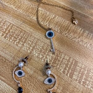 Evil eye official SWAROVSKI necklace and earrings set excellent condition